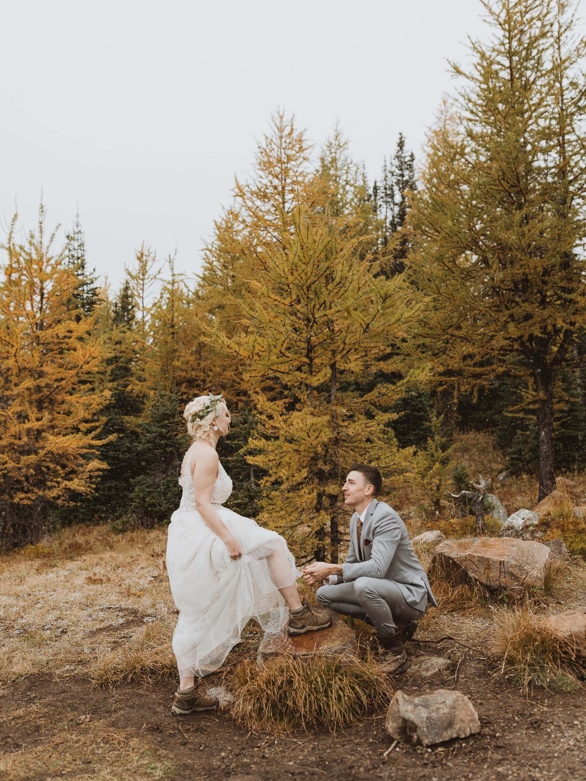 couple getting ready for their moraine lake hiking elopement