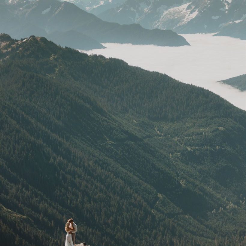 Couple is hugging on their adventure elopement in BC.